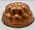 I love the look of antique copper jelly moulds on a kitchen wall. In fact it is a must in every classic French kitchen...