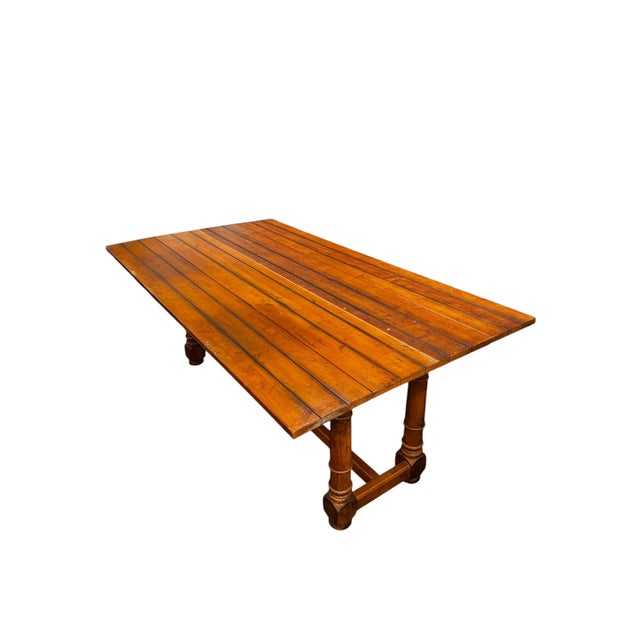 Warm, character-rich folding console table crafted in a beautiful honey-toned wood with a plank-style top. The elongated...