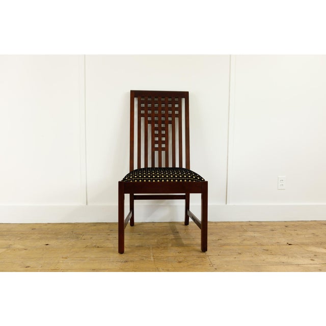 This exceptional set of four solid cherry dining chairs by the legendary American maker Stickley represents a brilliant...