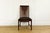 This exceptional set of four solid cherry dining chairs by the legendary American maker Stickley represents a brilliant...