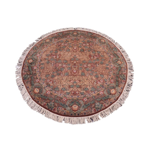 This hand‑knotted Pak Persian round rug showcases the finest expression of traditional Persian artistry. Each piece is...