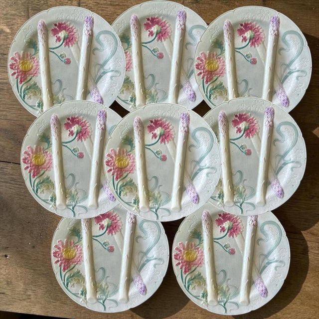 A rare and particularly elegant example of a French asparagus plate from the esteemed K&G Luneville / St. Clément faience...