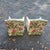 This pair of chairs is beautifully designed and ready to be displayed. It features a pink and green floral pattern to...