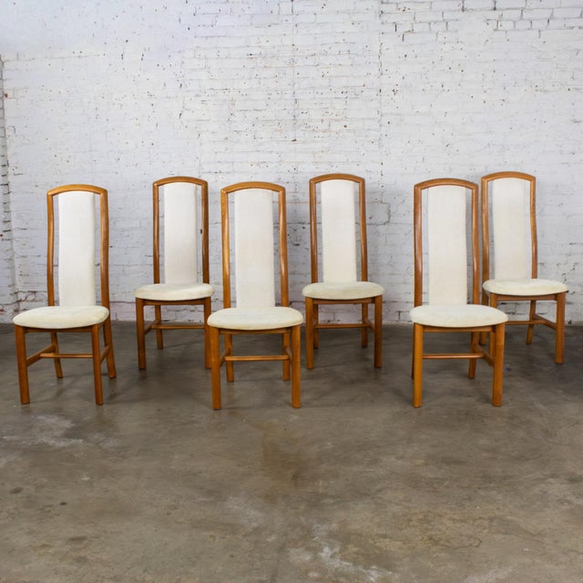 Attractive vintage Scandinavian Modern set of 6 dining chairs by Skovby Furniture composed of teak frames with high backs...