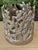 Charming coastal silver-colored jar or pillar candle holder, made by Mariposa. Made of cast aluminum, the inside has a...