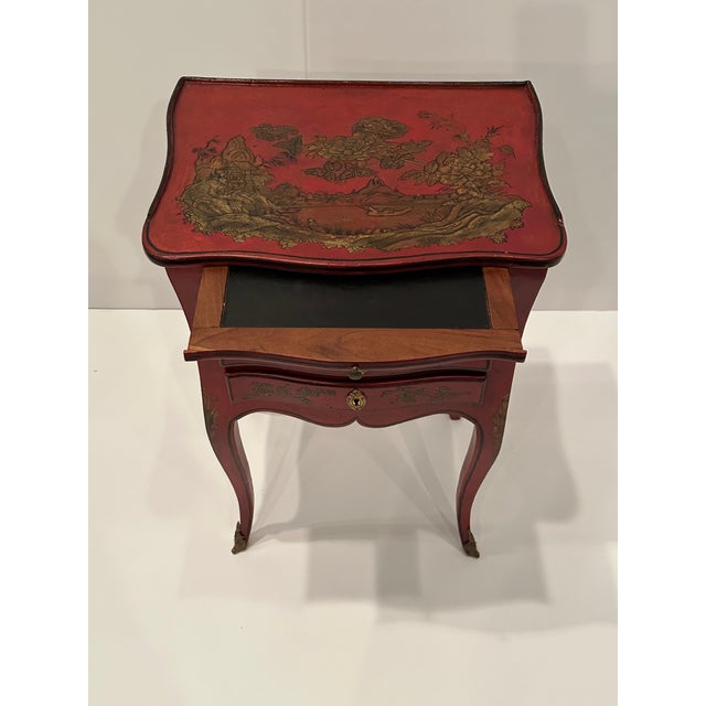 Lovely red & gold hand painted antique French chinoiserie stand, end table or writing table having elegant cabriole legs...