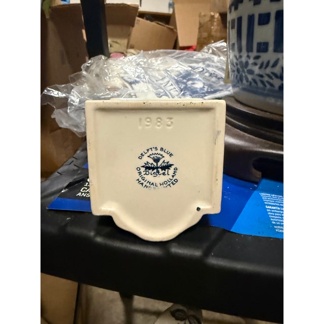 Up for sale is a charming, vintage Delft Blue ceramic miniature canal house. This clever decorative piece features an...