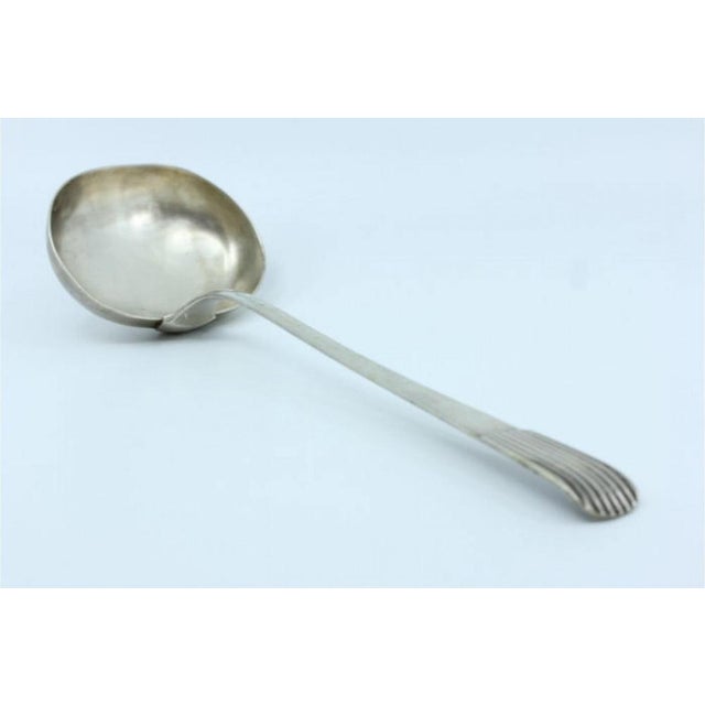 Silver Soup Ladle with Friezes, Scrolls and Monogram Card, in Very Good conditions. Designed before 1890 This piece has an...