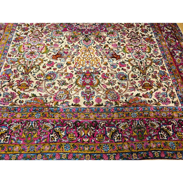 "A magnificent Persian Kerman Lavar room size rug circa the early 20th Century. This rug features a captivating all-over...