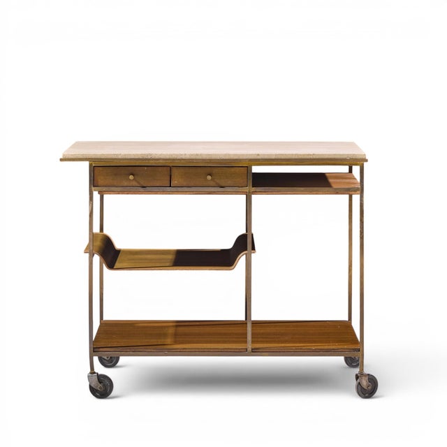 Paul McCobb for Calvin Irwin Collection Mid Century Travertine, Brass and Mahogany Bar Cart This bar cart measures: 36.5...