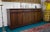 A large English chest of drawers made around 1980 in a traditional classicist style. The furniture stands out for its...