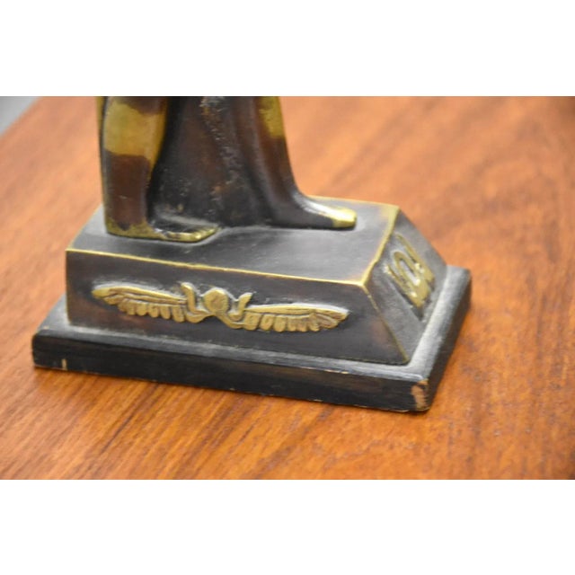 A vintage bronze Egyptian sculpture.