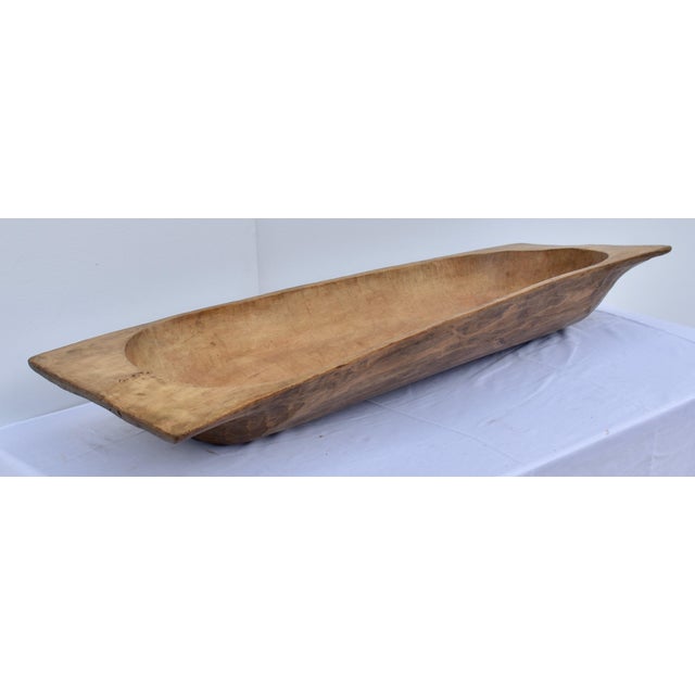 Our European antique wooden dough bowls or trogs are hand-hewn from whole split logs. They feature remarkable handiwork...