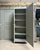 This 1940s wardrobe embodies the best of late art deco: rigorous geometry, a tall and slender silhouette, and a complete...