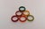 Complete set of six vintage bakelite napkin rings (ca. 1930s, USA). Attractive combination of colors - lime, emerald...