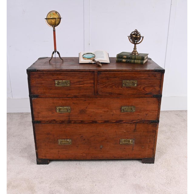 A handsome antique campaign chest dating to the circa 1880, traditionally designed for travel and military use stamped on...