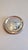 Large round mirror with beveled glass and a nickel-plated brass frame. Made in Italy between the late 1960s and early...