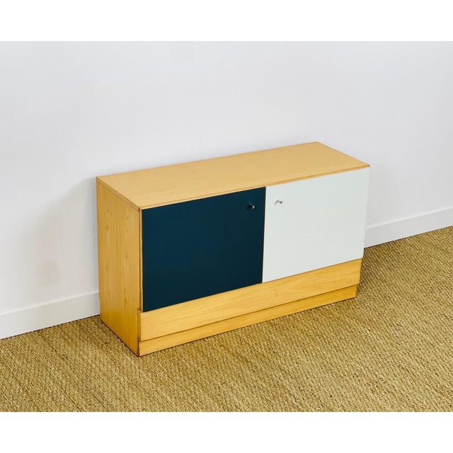 Vintage sideboard, low side table dating from the 1960s, featuring two storage doors and a drawer. Doors painted white and...