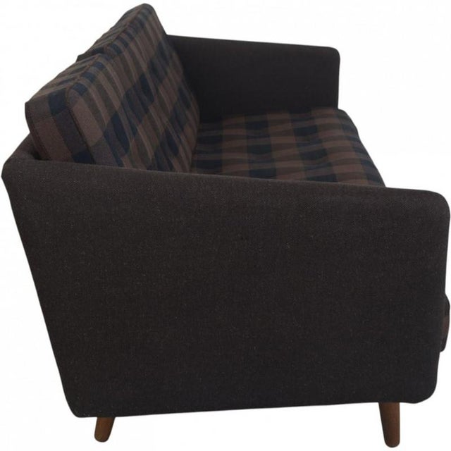 Børge Mogensen 3.seater sofa, model no1, upholstered in brown fabric and with legs of oak. The sofa is from the 1980s but...
