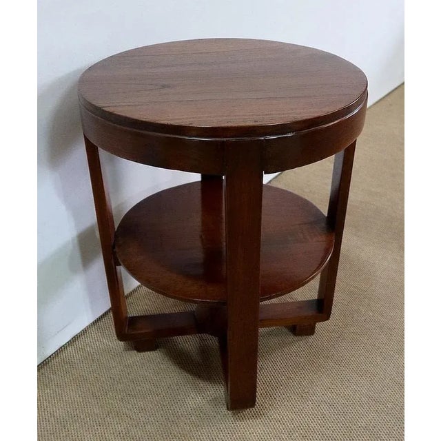 Small circular table, entirely made of solid teak wood, from Pondicherry, former capital of French India. Its top,...