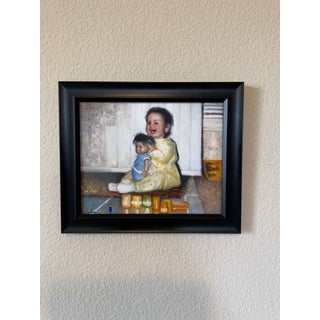 Baby Abby by Matteo Di Ventra | Oil on Paper Portrait of a Smiling Baby with a Doll For Sale