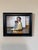Baby Abby by Matteo Di Ventra | Oil on Paper Portrait of a Smiling Baby with a Doll For Sale