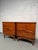 Handsome pair of mid-century nightstands showcasing rich grain and clean modern lines. Each piece offers practical storage...