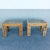 Charming pair of vintage Boho Chic side tables crafted from woven natural rattan and wicker with inset clear glass tops....