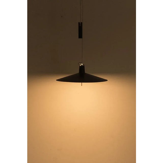 Beautiful Metal Hanging Lamp with counterweight from the 1960s. The Lamp is Adjustable in Length. Has some traces of use...