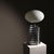​This table lamp is a quintessential design classic, designed by Ingo Maurer in the late 1960s for his own company Design...