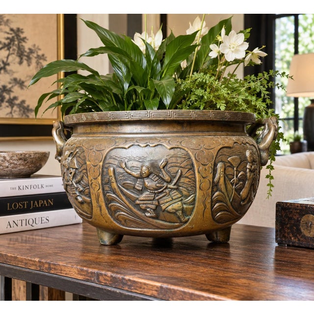 late-19th-century Meiji bronze planter just two months ago with warriors from folklore cast in relief inside cloud-...