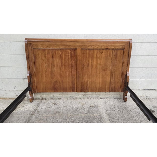 This is a stunning vintage traditional Louis Phillipe style Queen size sleigh bed. It features a paneled headboard and...