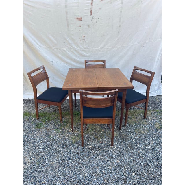 A beautiful, matching set of four original mid-century modern dining side chairs designed by Merton Gershun for the...