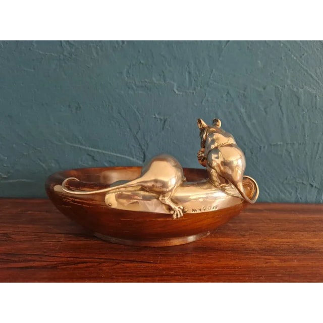 Wonderful large nast peel made of precious wood with silver gear in the display of two mice, one with a real nut. The gear...