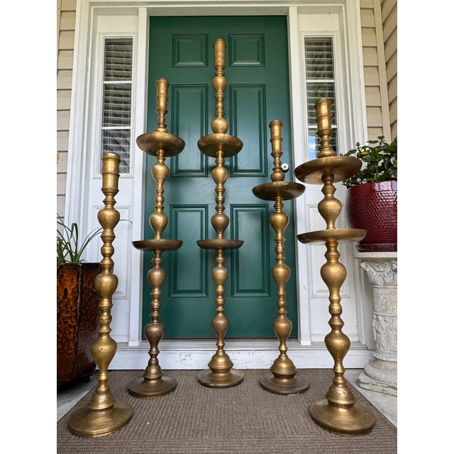 Offering for sale this impressive set of 5 Moroccan-style, etched brass, altar-style, pillar floor candle holders, which...