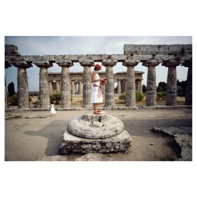 Slim Aarons, Laura Hawk in Paestum, Estate Stamped Photographic Print, 1984 / 2020s For Sale