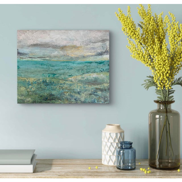 Many layers of acrylic paint and textural materials create the ethereal look of this original seascape. Accents of...