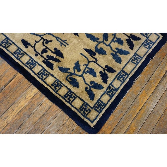 1930s Antique Chinese Peking Ivory Wool Hallway Runner Rug. Circa Date: 1930s. This exceptional piece represents the...