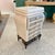 A beautiful 1980's tessellated stone chest of drawers/jewelry armoire, with 5 black felt lined drawers with elegant stone...