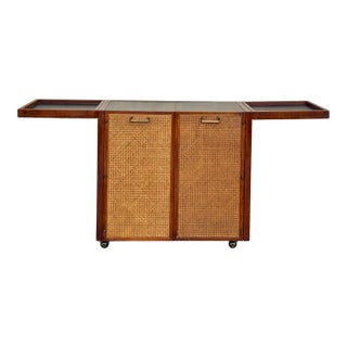 Mid Century Walnut Bar Cabinet With Sliding Top Extension and Cane Doors For Sale