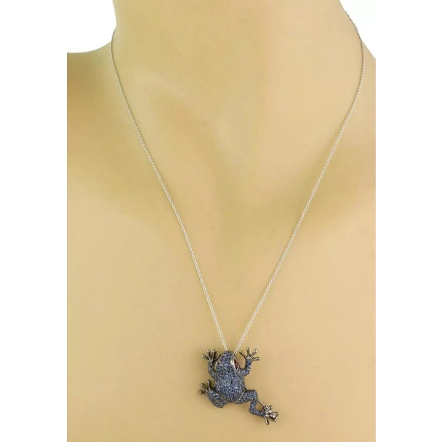This adorable frog pendant and brooch comes with a classic link chain which is crafted from 18k white gold, the...