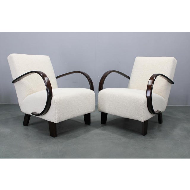 This striking pair of Art Deco armchairs was designed by Jindřich Halabala and produced in Czechoslovakia during the...