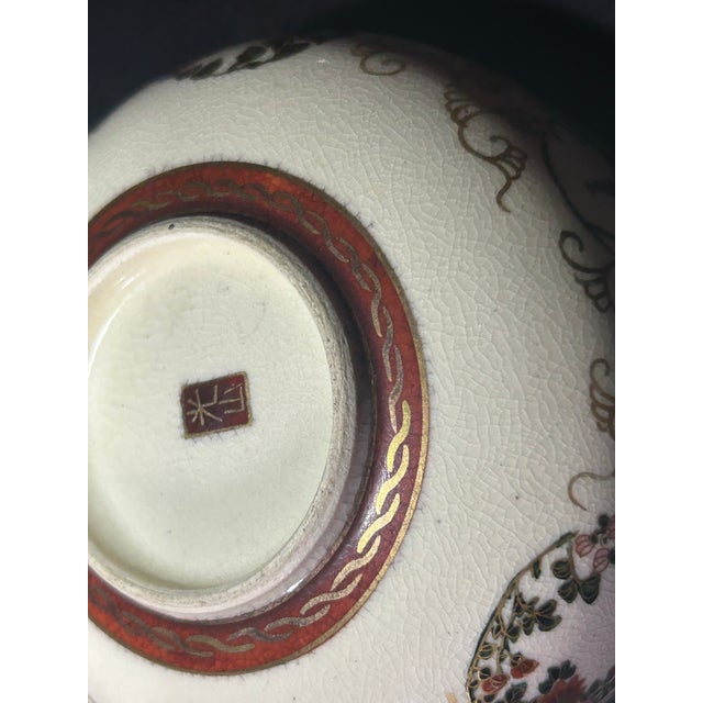 "An exquisite, authentic late Meiji period (1868-1912) Japanese Satsuma earthenware lobed bowl. Hand-decorated by the...