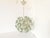 A sputnik shaped ball of daisies. This chandelier has a full 8 inches for chain and extends from the ceiling like a...