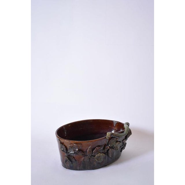 Brown and green low relief ceramic planter, 1950s. Height: 16 cm - 6.3 in Length: 38 cm - 14.96 in Width: 26 cm - 10.24 in