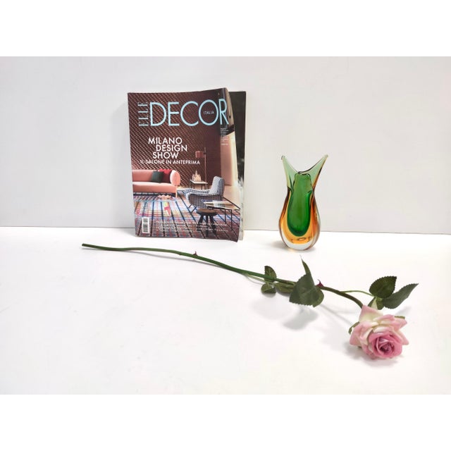 Made in Italy, 1950s. This vase is made in Sommerso Murano glass, which has been hand blown with three different colors:...