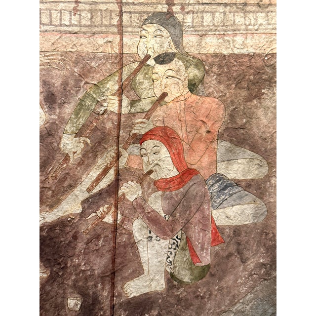 The art depicts the style of 19th century temple mural in Northern Thailand. Believe to be painted on very fine fabric or...