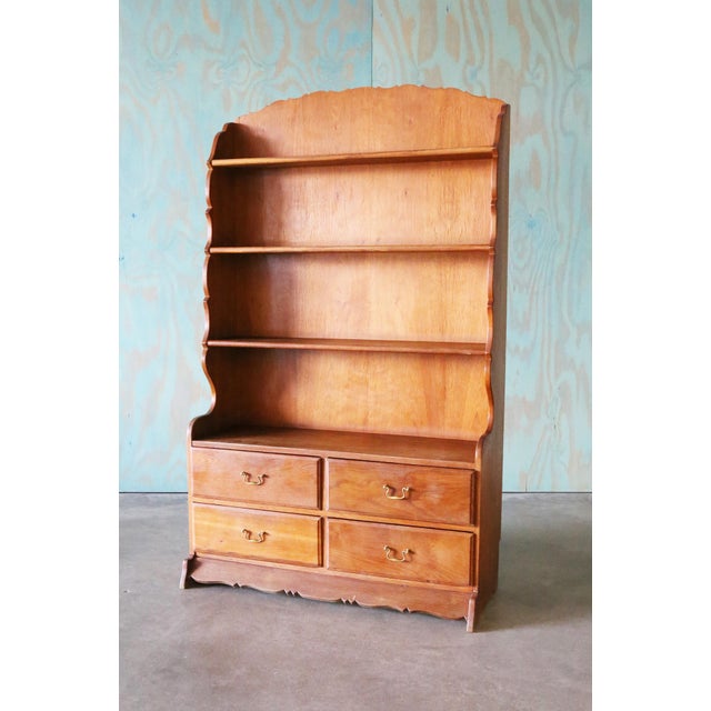 A Scandinavian oak book case / bookshelf above 4 drawers for extra storage. Scalloped edges add interest and sense of...