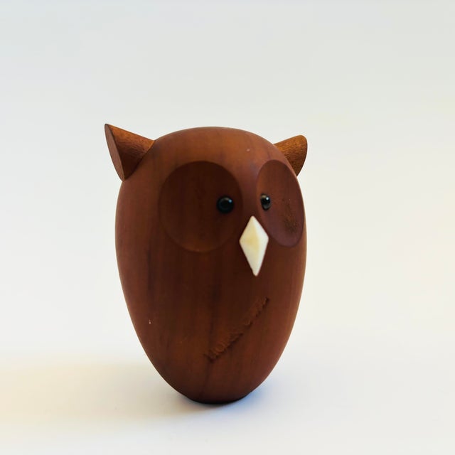 A mid century turned wood figurine in the shape of a Horn Owl. Adorable stylized features. Made in Japan by Senshukai as...