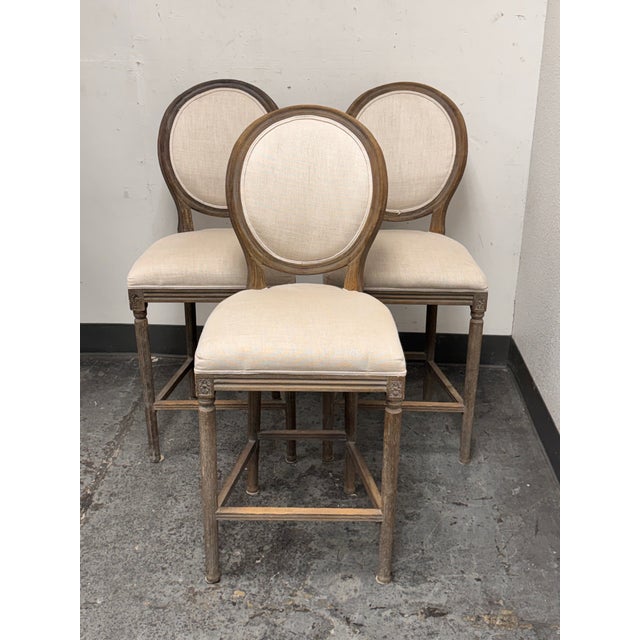 Design Plus Gallery presents the Set of Three French Oval Back Barstools from Restoration Hardware. These reproductions of...